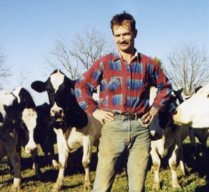 Farmer with cows