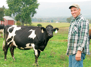 Farmer with cows