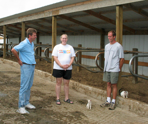 Farmers in front of stalls