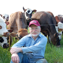 Farmer with cows