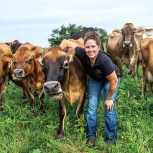 Farmer with cows